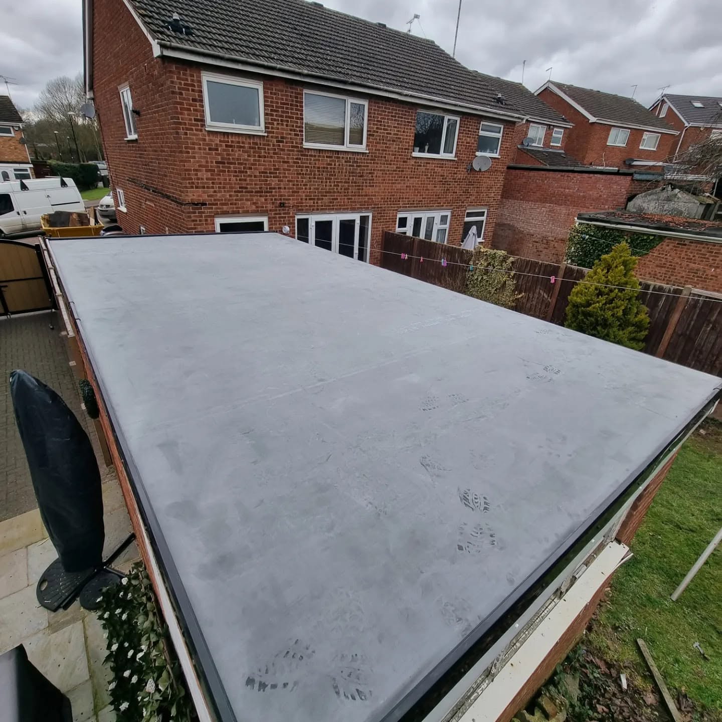 New EPDM rubber flat roof installation by JP Bobcat Roofing — flat roofing specialists in Warwickshire