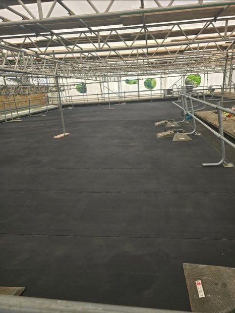 Bays of glass fibre reinforced Resitrix membrane laid across the Compton Verney gallery roof