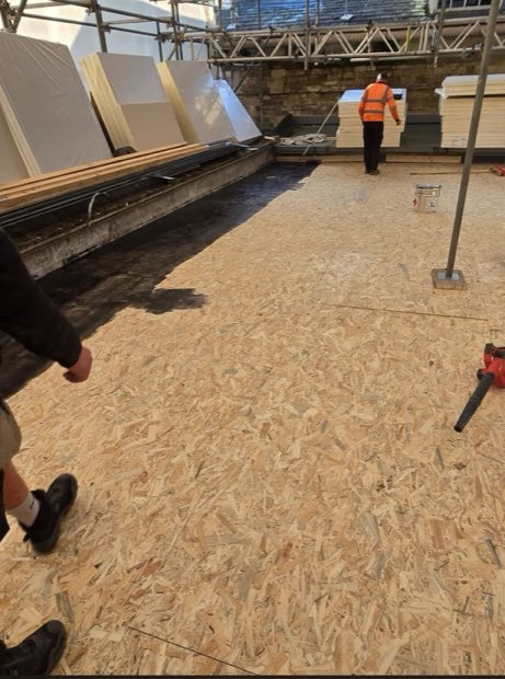 New warm deck build-up at Compton Verney with insulation boards and decking laid ready for membrane